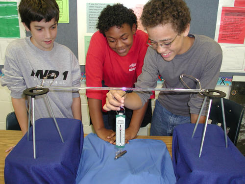 Students with Experiments